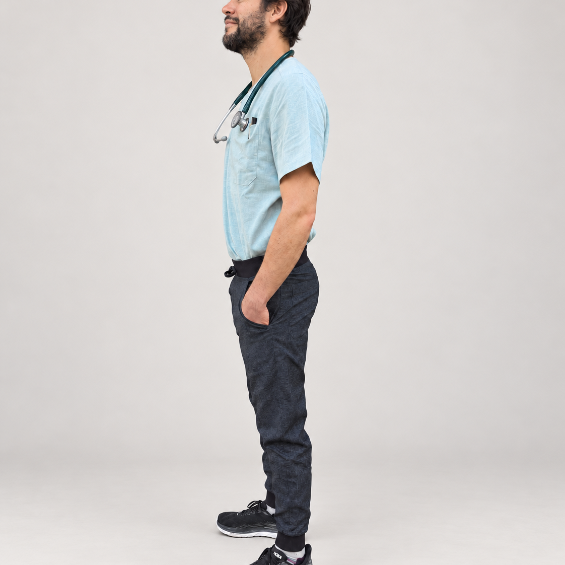 Lucca scrub pants side view with full model and shoes